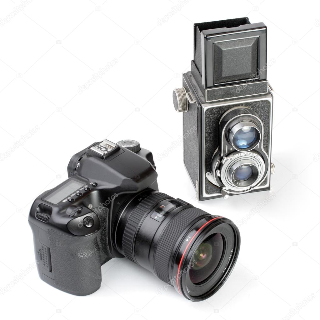 Modern dslr camera and vintage medium format two-lens camera