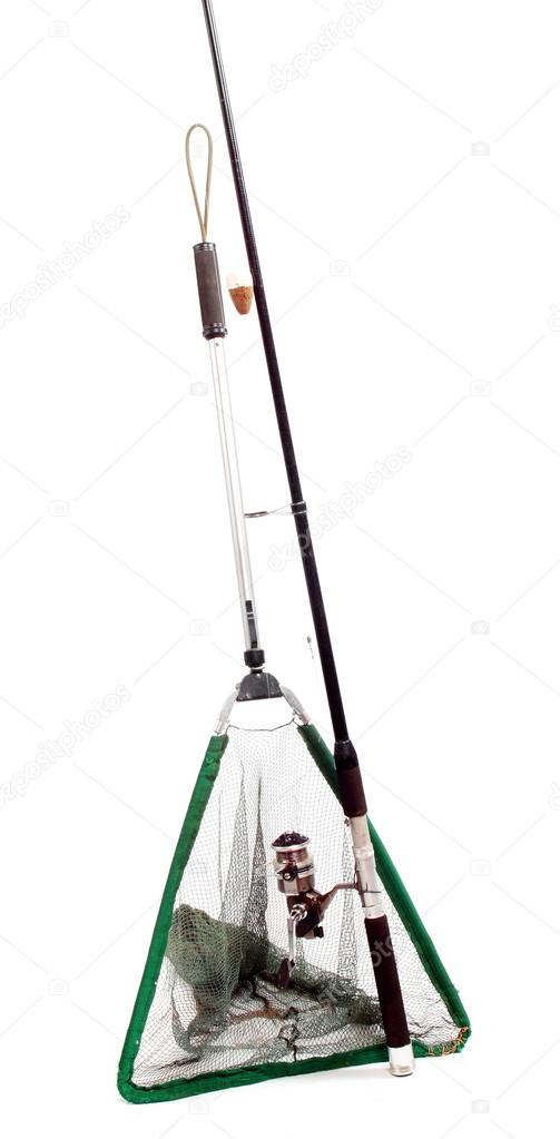 Fishing rod with reels and landing net.