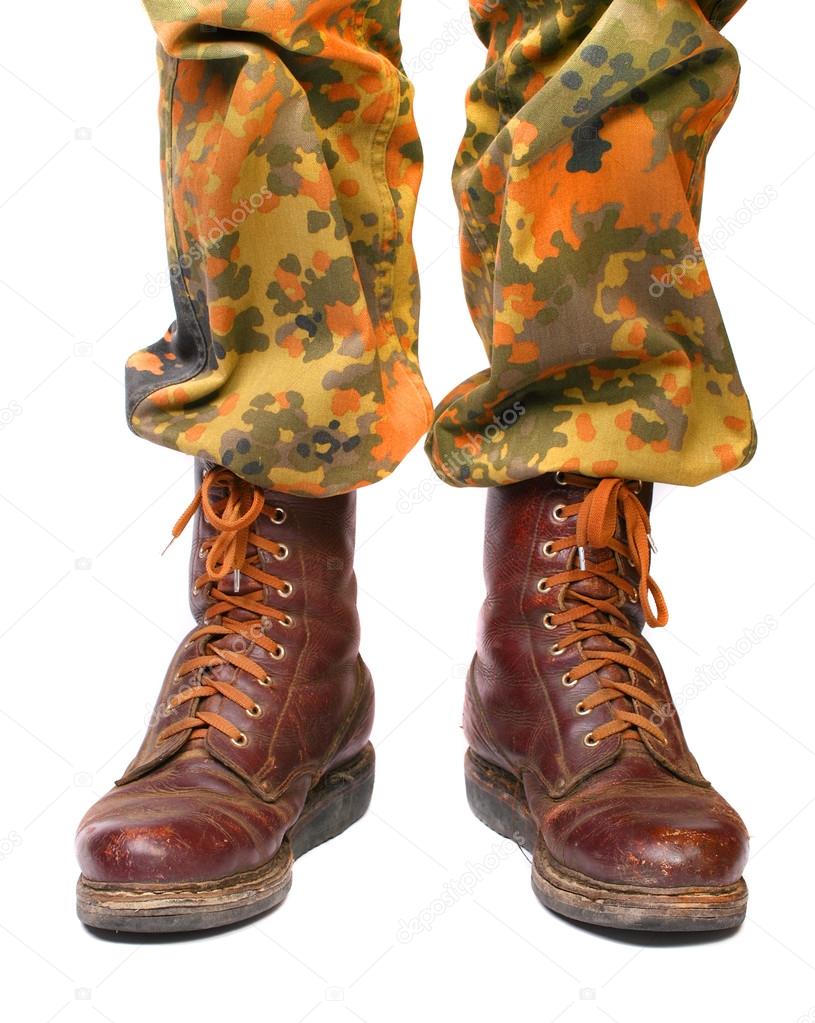 Soldier legs in old army paratroopers combat boots