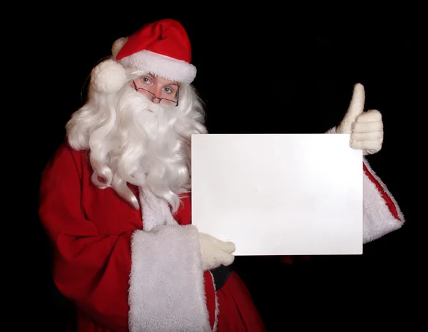 Santa visar papper — Stockfoto