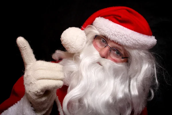 Santa wyświetlone palcem wskazującym — Zdjęcie stockowe