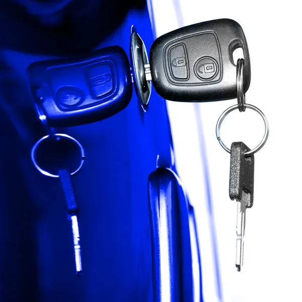 Key at car doors — Stock Photo, Image