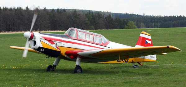 Plane on field — Stock Photo, Image