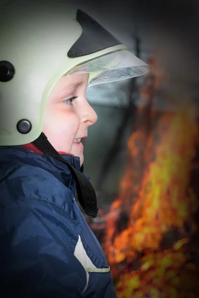 Chlapec hasič — Stock fotografie
