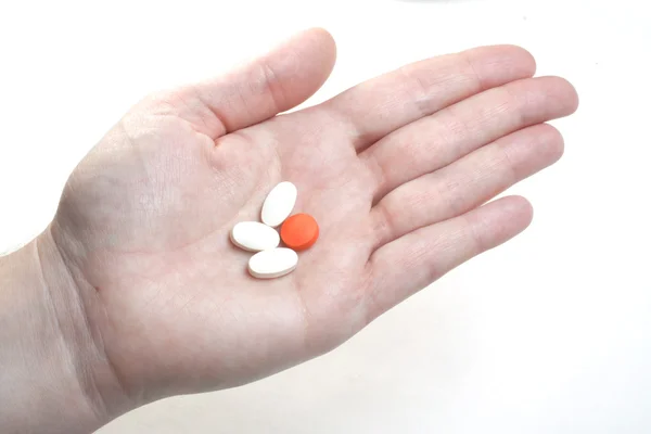 Palm with colorful pills. — Stock Photo, Image