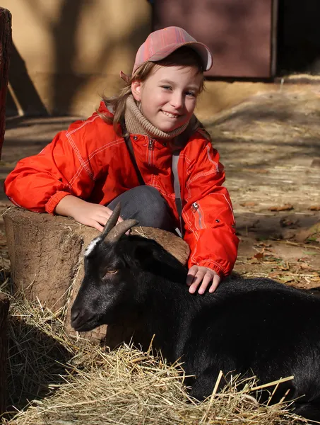 Girl with goat — Stock Photo, Image