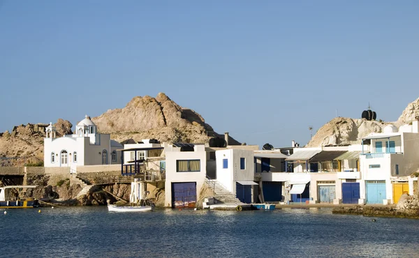 Fisherman houses built into rock cliffs Mediterranean Sea Firop — Stock Photo, Image