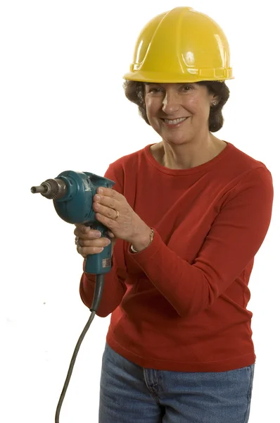 Vrouw met elektrische boor — Stockfoto