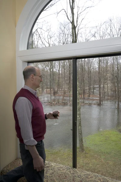 Looking at flooded backyard — Stock Photo, Image
