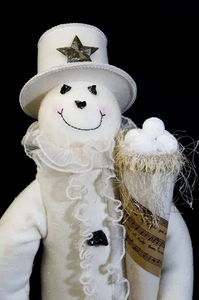 Sneeuw man met sneeuw ballen en hoed — Stockfoto