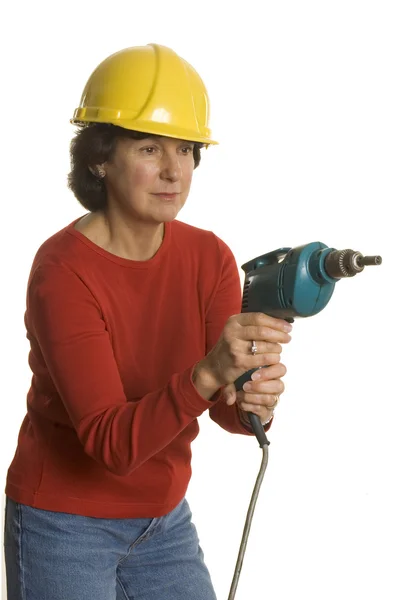 Mujer con taladro eléctrico — Foto de Stock