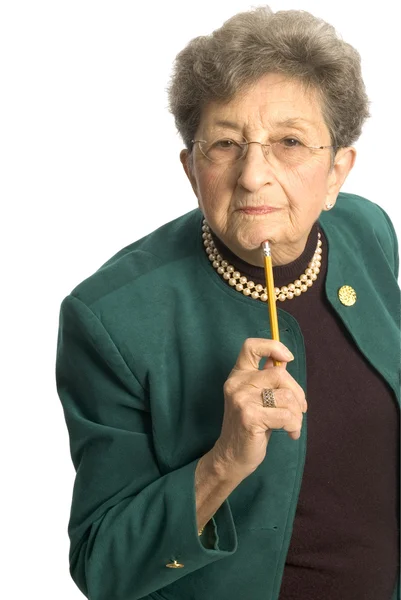Äldre kvinna med penna — Stockfoto