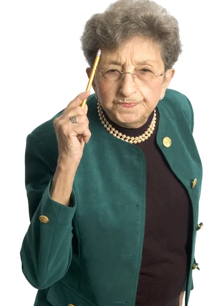 Senior woman with pencil — Stock Photo, Image