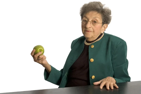 Femme âgée avec pomme — Photo