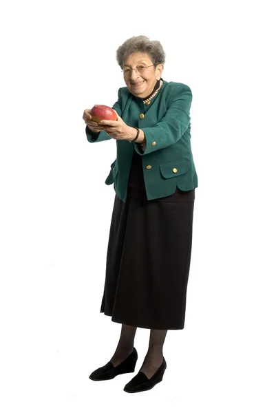 Senior woman with mango — Stock Photo, Image