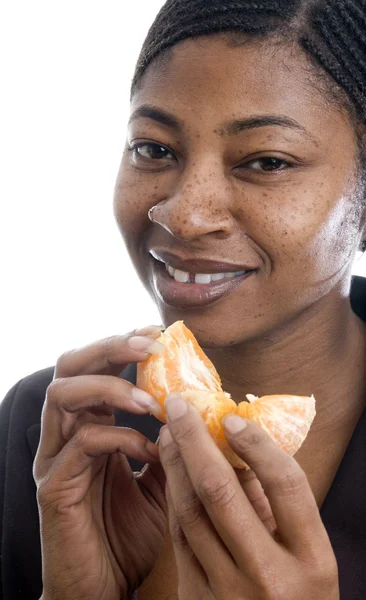 Smiling woman with tangerine — Stock Photo, Image