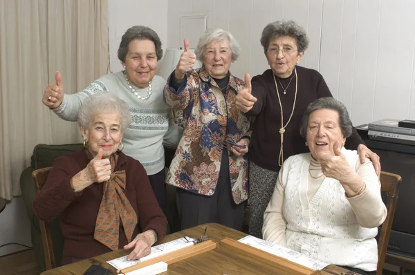 Senior women at the game table Telifsiz Stok Imajlar