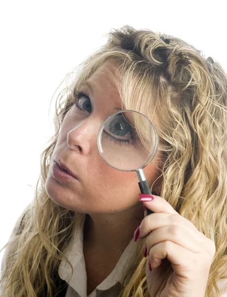 Woman with magnifying glass — Stock Photo, Image