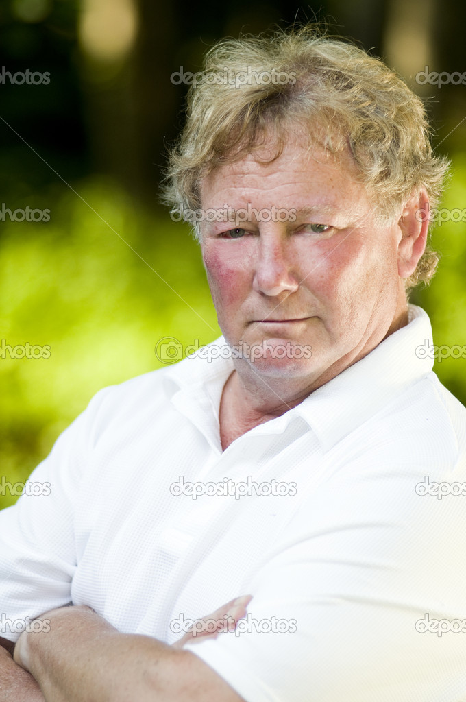 serious middle age senior tennis player male