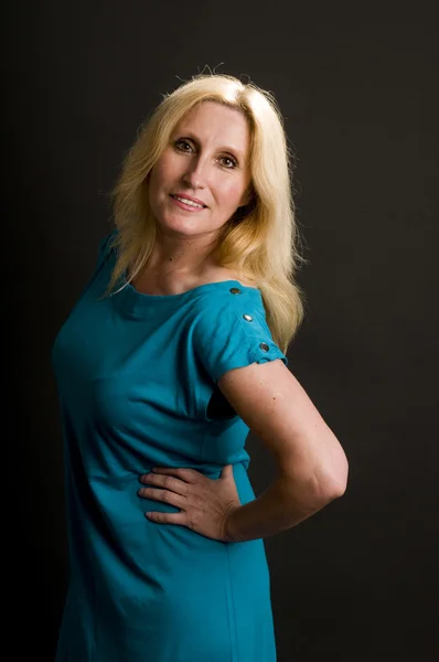 Glamorous woman posing in cocktail dress — Stock Photo, Image