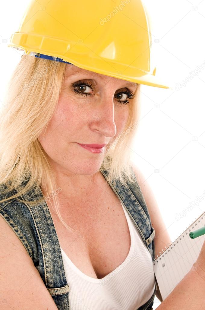 sexy contractor construction lady writing a contract estimate