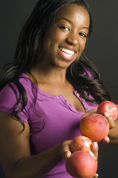 Pretty latina hispanic african american woman with healthy fresh fruit — Stock Photo, Image