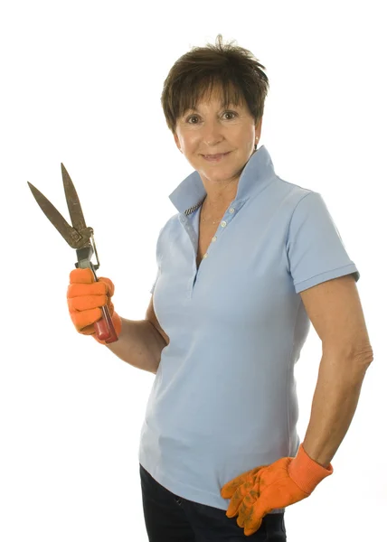 Female middle age senior woman gardener hand tool grass clippers — Stock Photo, Image