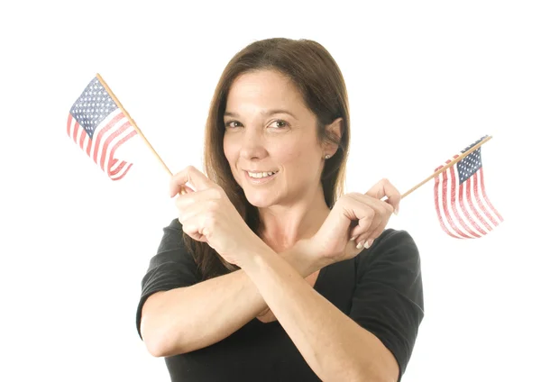 Happy woman waving patriotic American flags — Stock Photo, Image