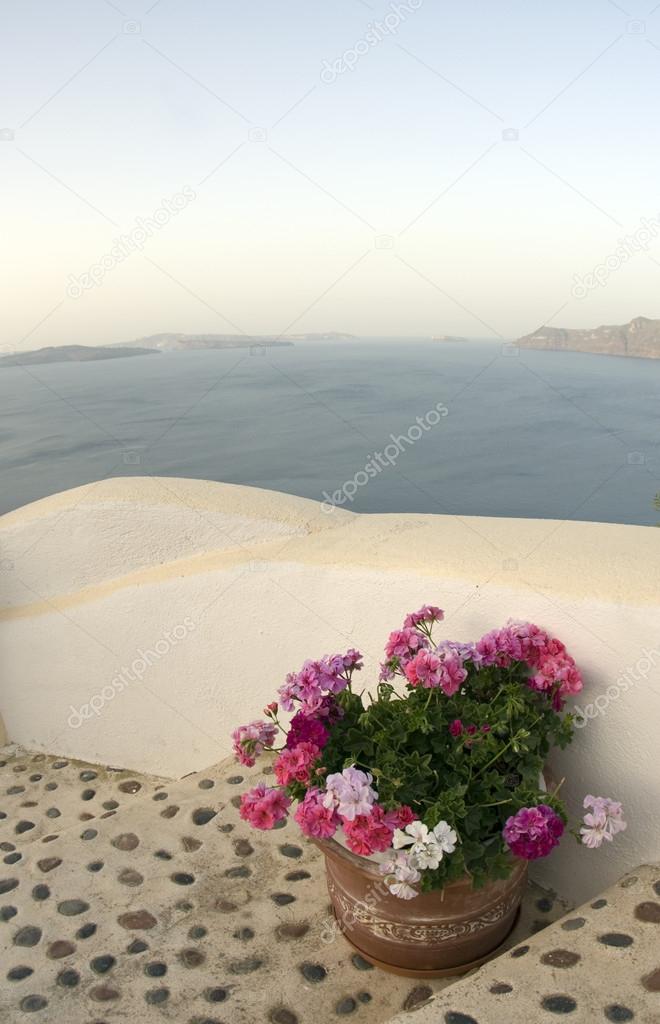 flowers on staircase with stone inlay santorini