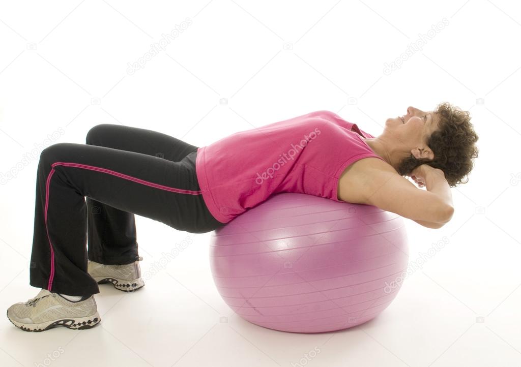 woman exercising core training fitness ball