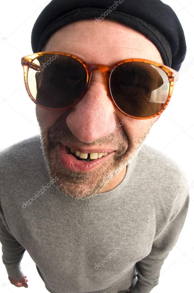 aging artist distorted nose close up beret hat smiling happy