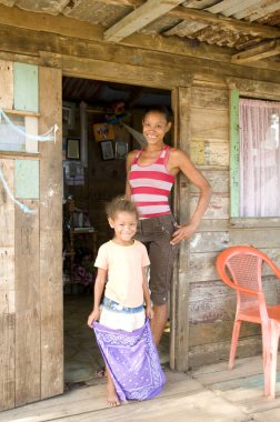 mother daughter native house Big Corn Island Nicaragua clipart