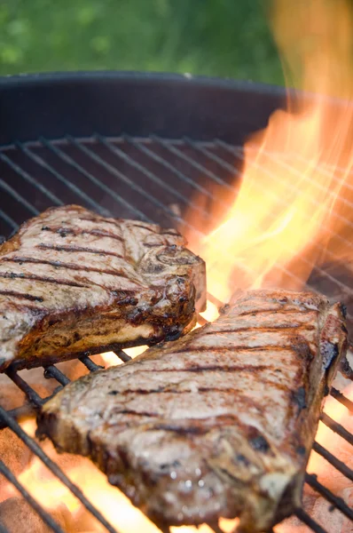 Steaks on the grill — Stock Photo, Image