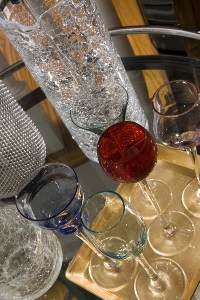 Fancy cocktail glasses and crackled glass — Stock Photo, Image