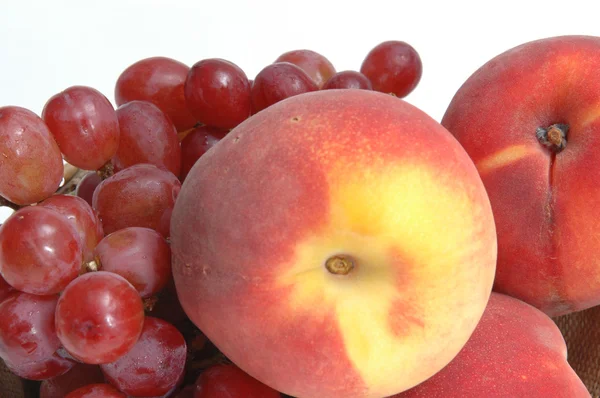 Grapes and peaches — Stock Photo, Image