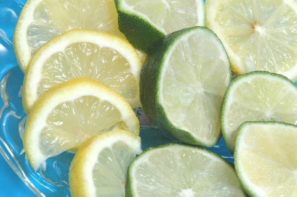 Lemons and limes — Stock Photo, Image