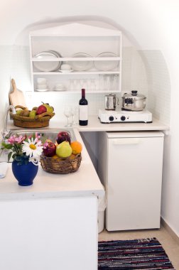 kitchenette kitchen in greek island villa apartment clipart