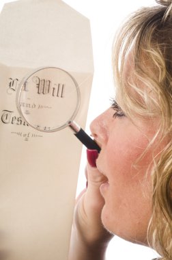 woman inspecting last will and testament clipart
