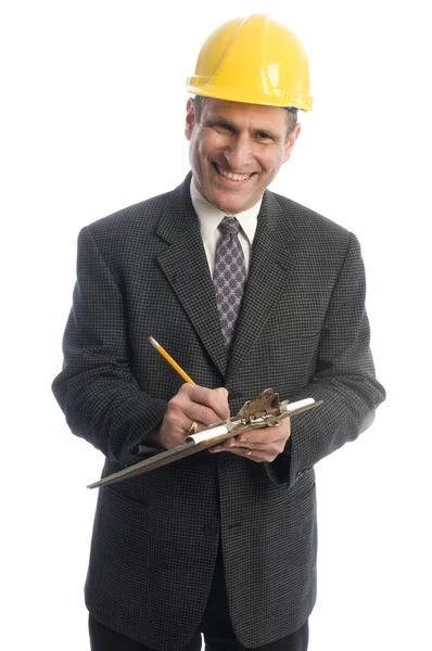 Happy man writing contract estimate — Stock Photo, Image