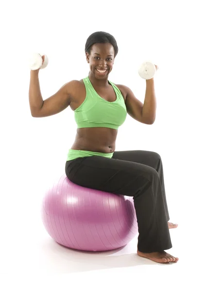 Young pretty hispanic african american woman exercising with fit — Stock Photo, Image