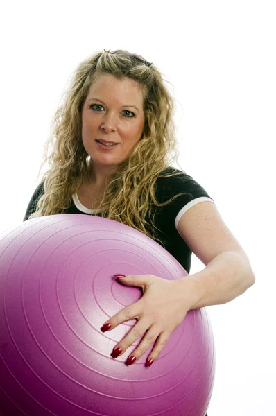 Pretty middle age woman exercising with dumbells — Stock Photo, Image