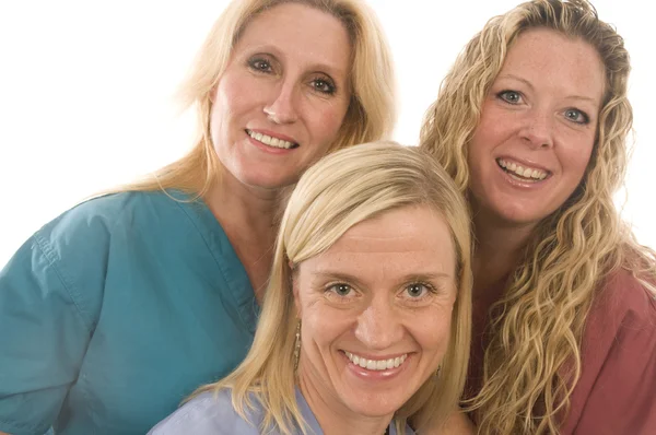 Три медсестры медицинские женщины со счастливым выражением лица — стоковое фото
