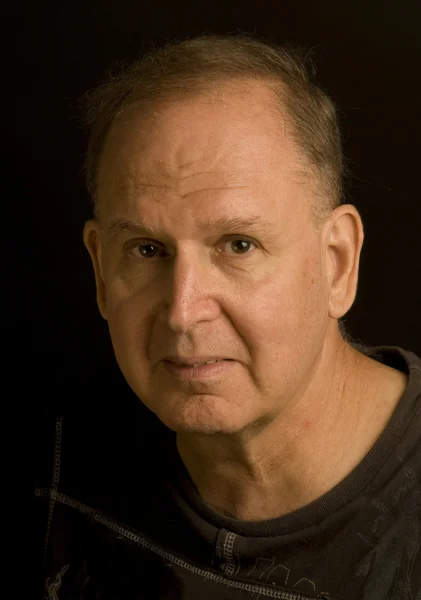 Senior man retired head shot portrait in tee shirt — Stock Photo, Image