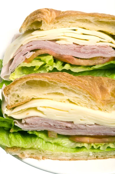 Gourmet ham swiss cheese sandwich on croissant bread — Stock Photo, Image