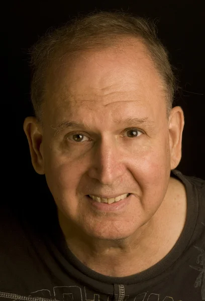 Senior man retired head shot portrait in tee shirt — Stock Photo, Image