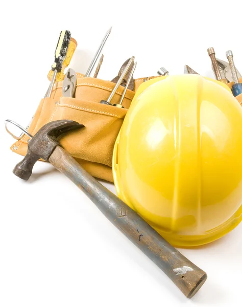 Suede leather tool belt with protective hard hat — Stock Photo, Image