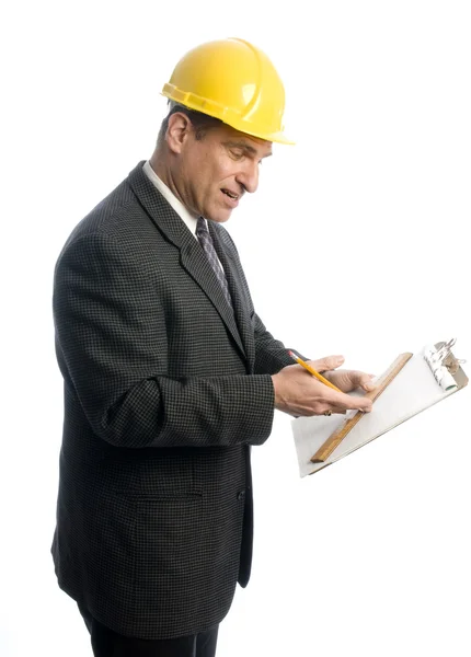 Excited contractor with clipboard Royalty Free Stock Images