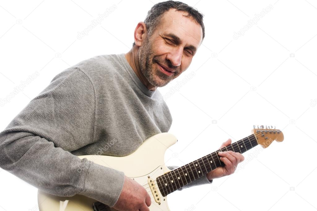 Middle age man playing guitar musician