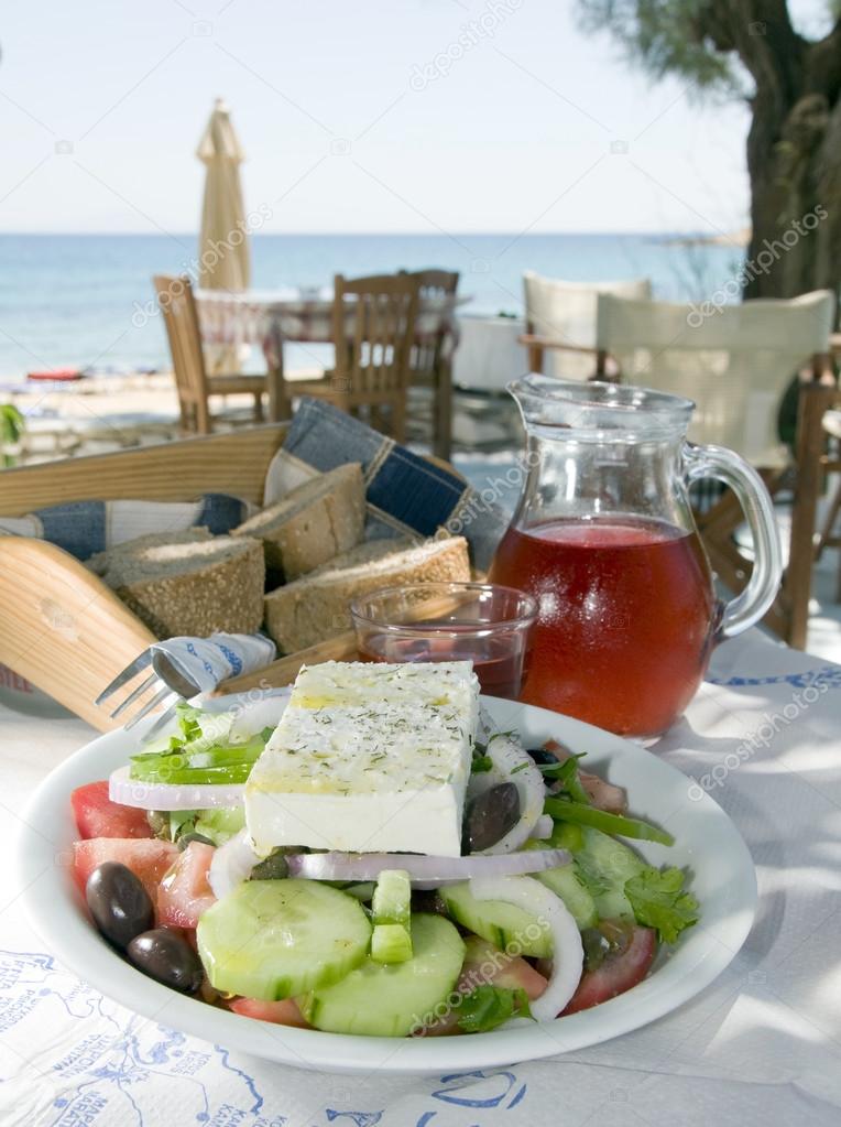 home made rose wine with greek salad and crusty bread at greek i