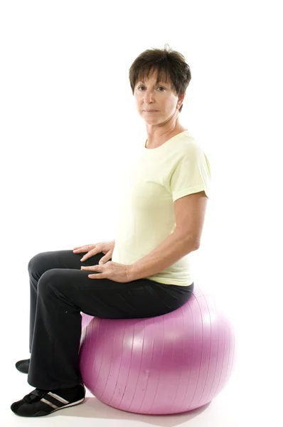 Woman using core training fitness ball exercising — Stock Photo, Image